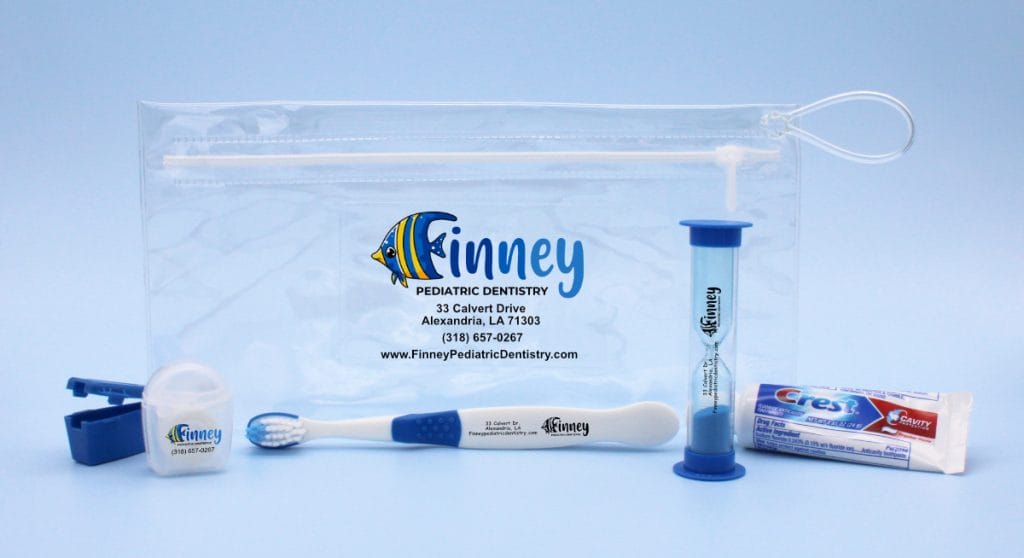 Child custom kit includes a child toothbrush, timer, paste, floss and travel cap imprinted with pediatric dentistry logo.